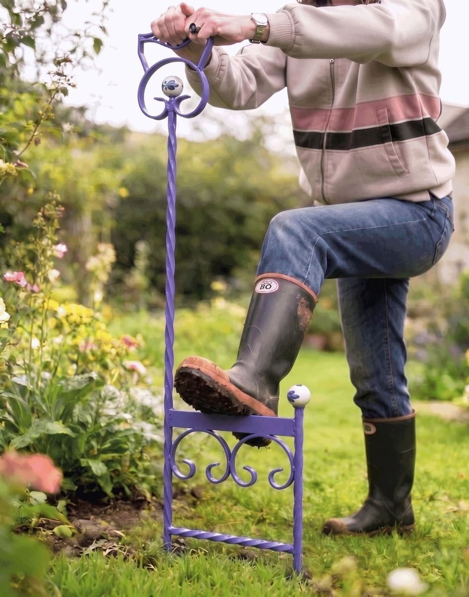 A Lilac Boot Scraper Shown Being Used by a Gardener Next to a Flower Bed - Digital Illustration