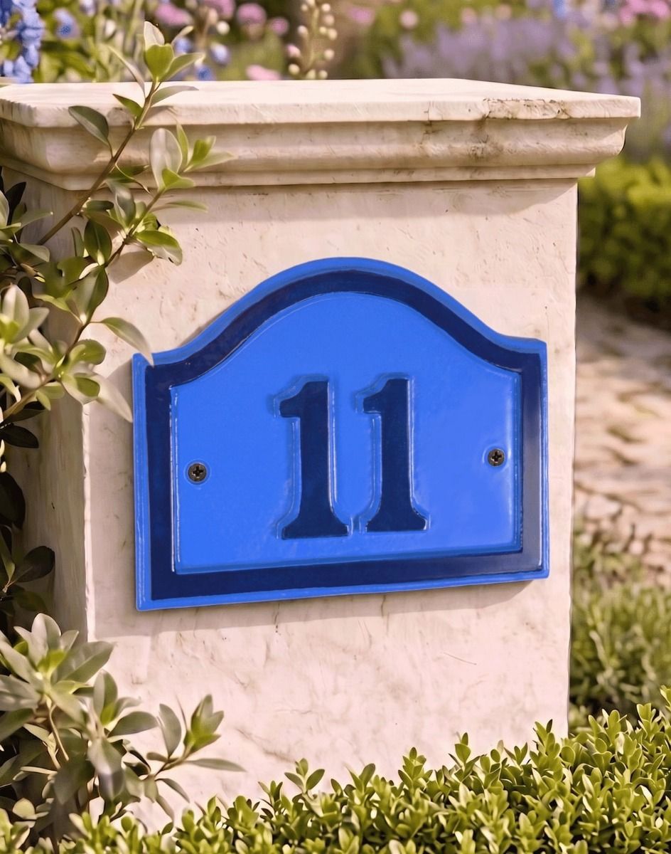 A Number 11 Blue and Dark Blue Painted Arched House Number Sign Mounted on a Entrance Driveway - Digital Illustration