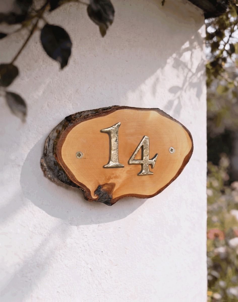 A Number 14 Natural Hard Wood Rustic House Number Sign Mounted on a Cream Coloured Cottage Wall - Digital Illustration 