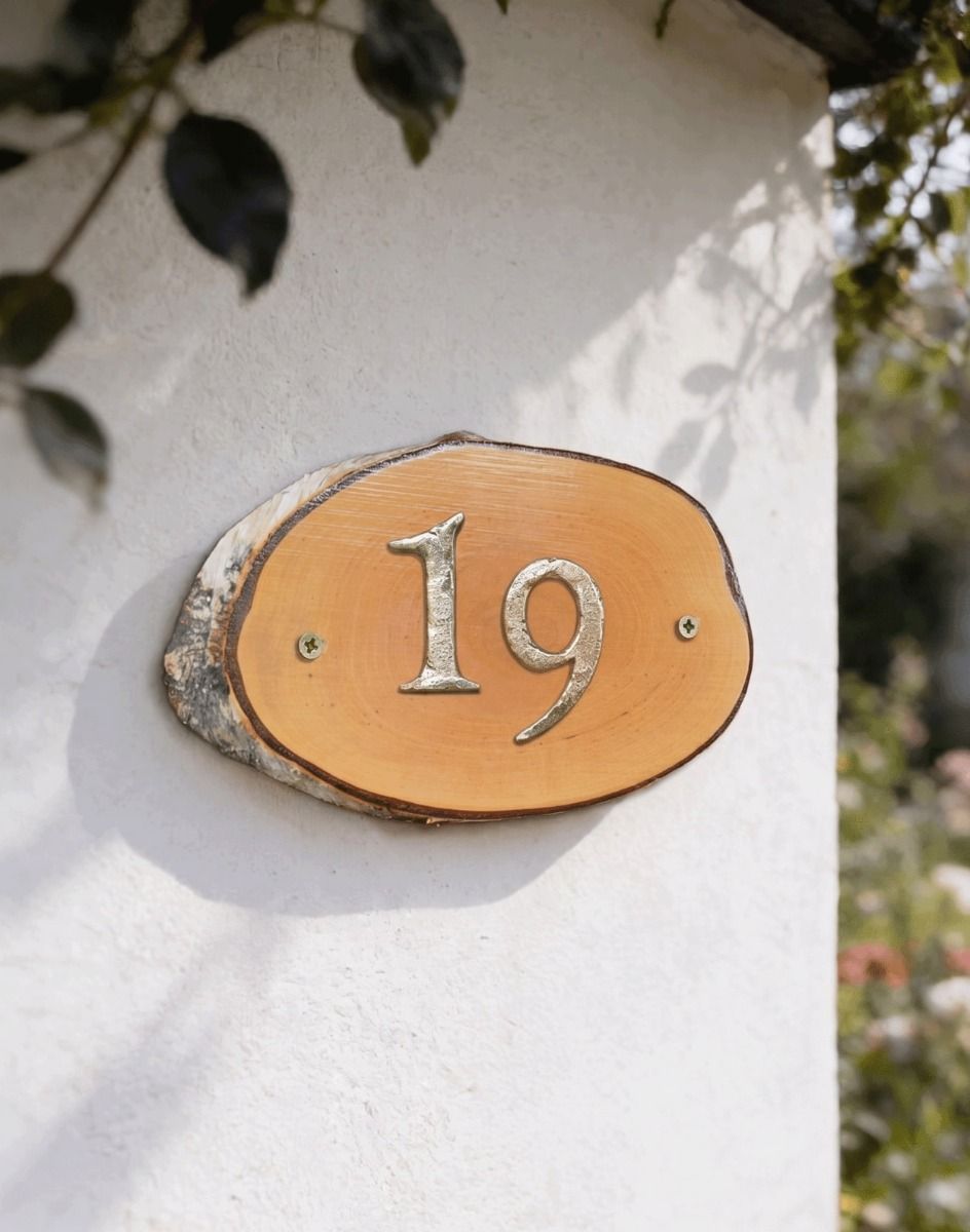 A Number 19 Natural Hard Wood Rustic House Number Sign Mounted on a White Garden Cottage Wall - Digital Illustration 