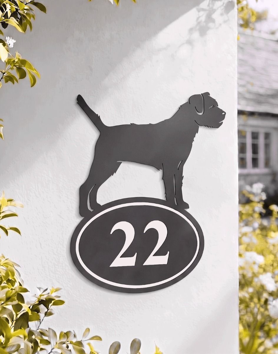 A Number 22 Border Terrier Iron House Number Sign Mounted on a White Coloured Country Property Home - Digital Illustration