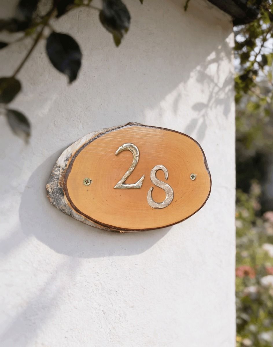A Number 28 Natural Hard Wood Rustic House Number Sign Mounted on a Cream Coloured Cottage Wall - Digital Illustration