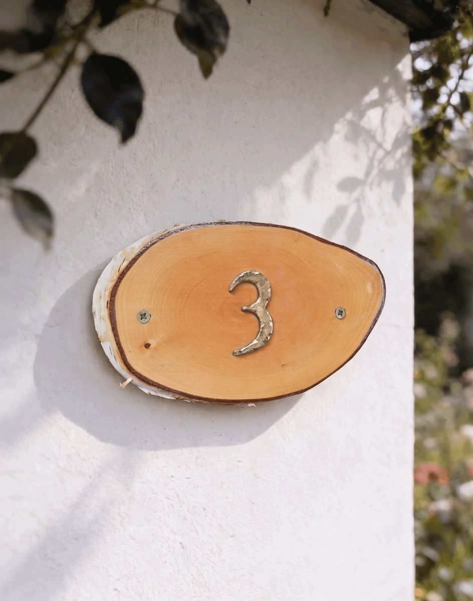 A Number 3 Natural Hard Wood Rustic House Number Sign Mounted on a Sunny White Housefront - Digital Illustration