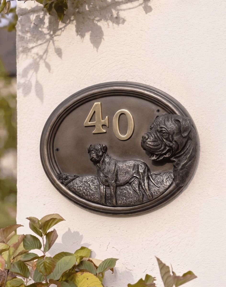 A Number 40 "Bentley" Bull Mastiff Dog House Sign Mounted on a Cream Coloured Sunny Cottage Wall - Digital Illustration 