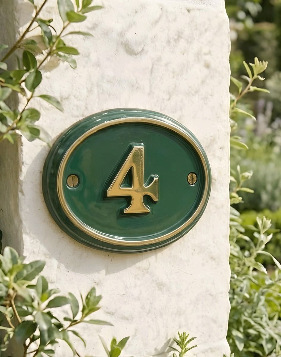 A Number 4 Polished Brass & Green Cast Oval House Number Sign On a Cream Coloured Cottage Wall - Digital Illustration 