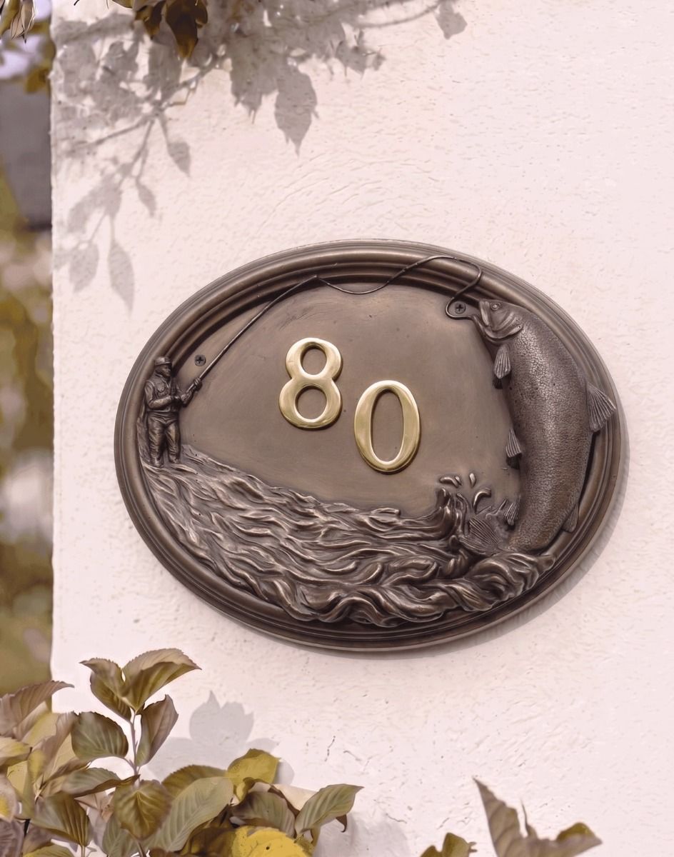 A Number 80 "Docklow Valley" Fisherman House Number Sign in a Bronze Finish Mounted on a Cream Coloured Cottage Wall - Digital Illustration 