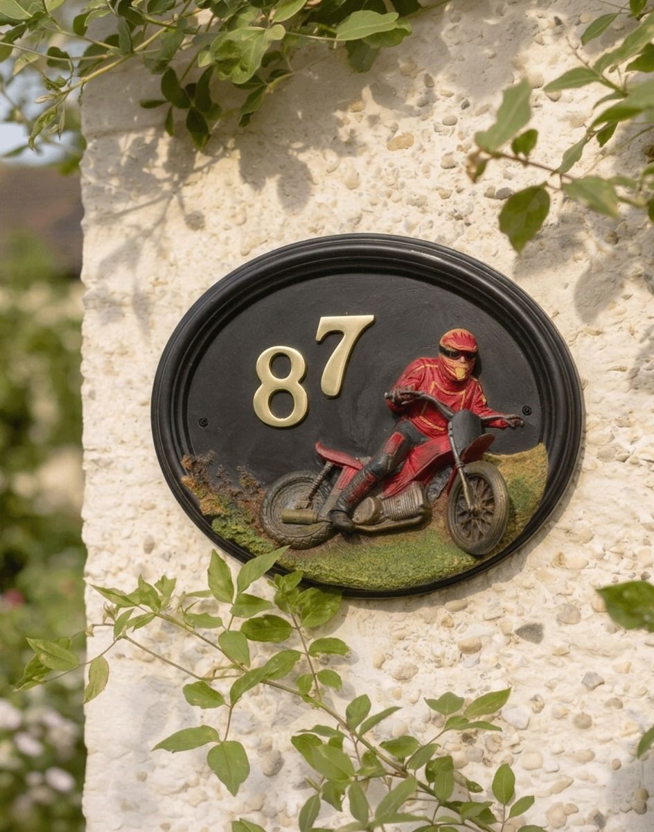 A Number 87 Hand Painted "Macio Motocross" House Sign Mounted on a Sunny Cottage Wall - Digital Illustration 