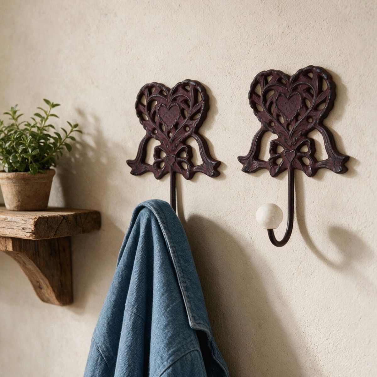 A Pair of "Amorette" Cast Iron Hooks In an Entrance Corridor to a Home - Digital Illustration