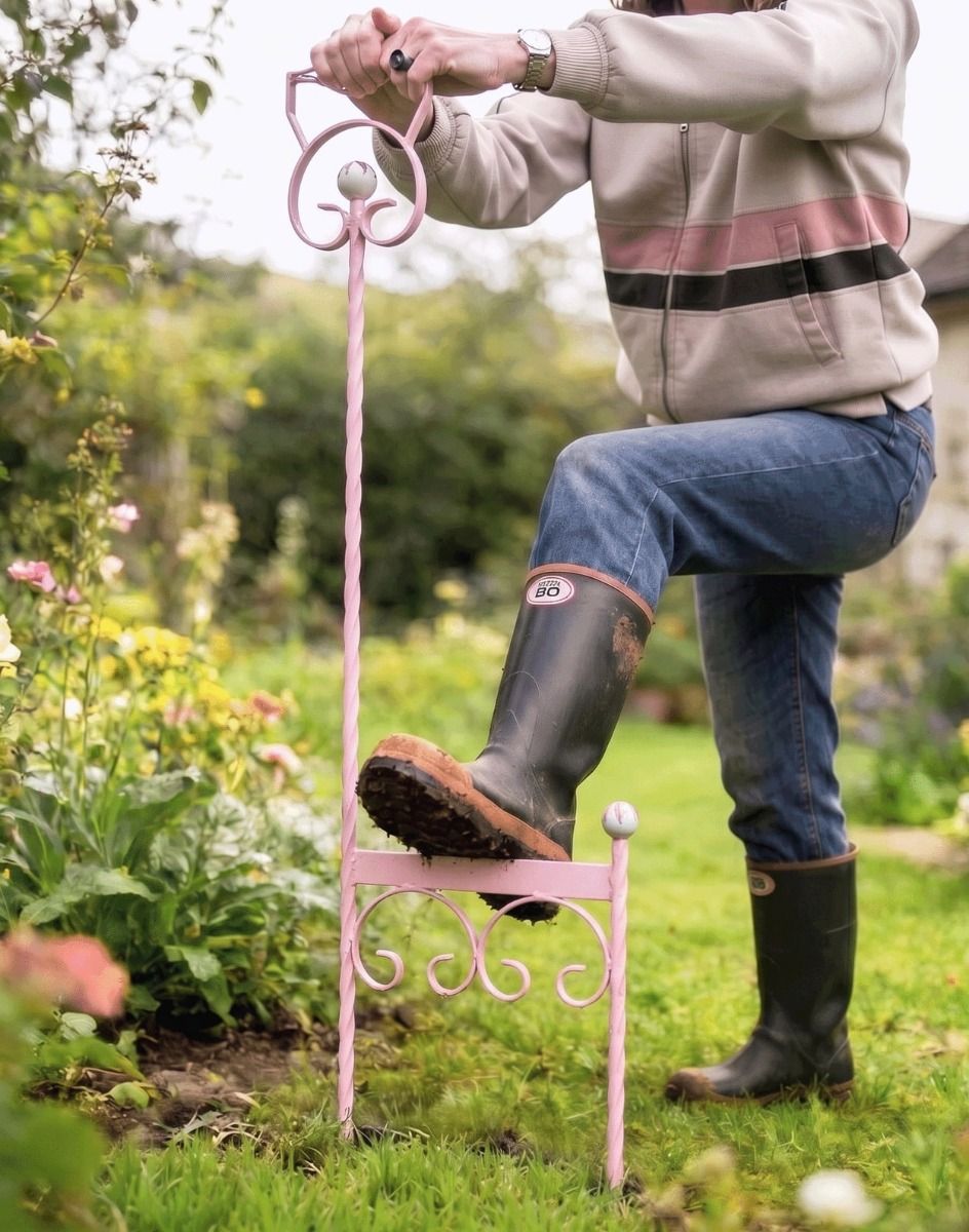 A Pink Boot Scraper Shown Being Used by a Gardener on a Lush Green Garden Lawn - Digital Illustration