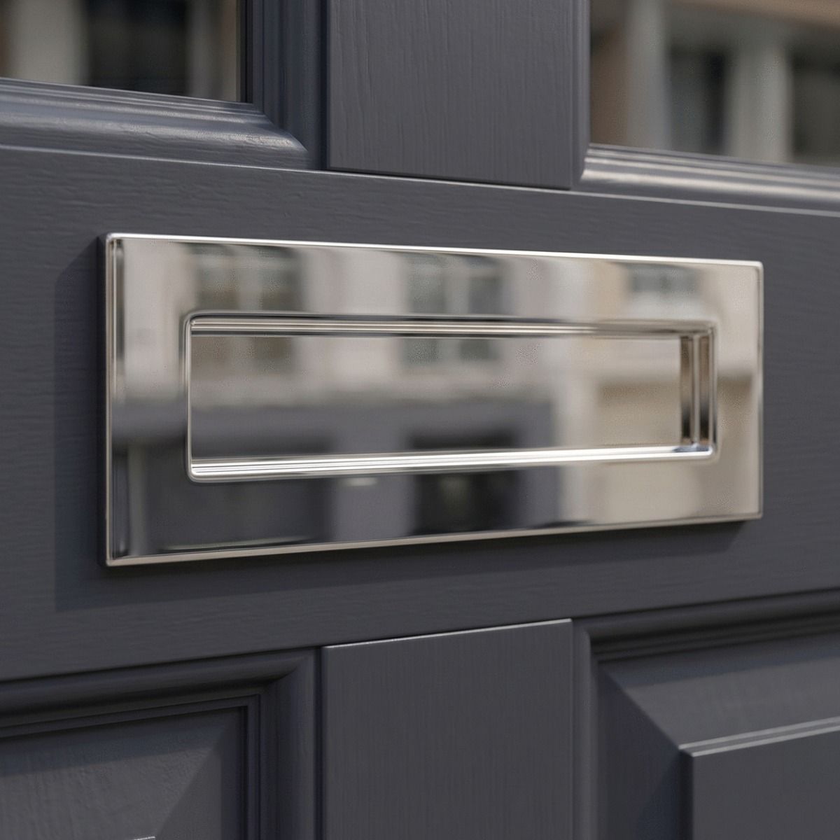 A Polished Nickel Large Traditional Letter Plate on the Front of a Wooden Front Door - Digital Illustration