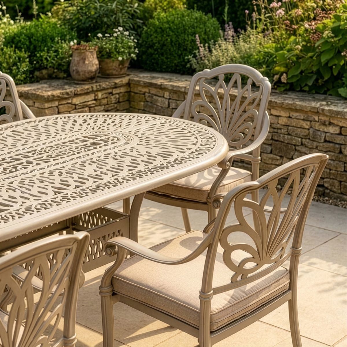 The "Marianne" 8-Seater Outdoor Dining Set - Antique Champagne digital illustration back of chair close up
