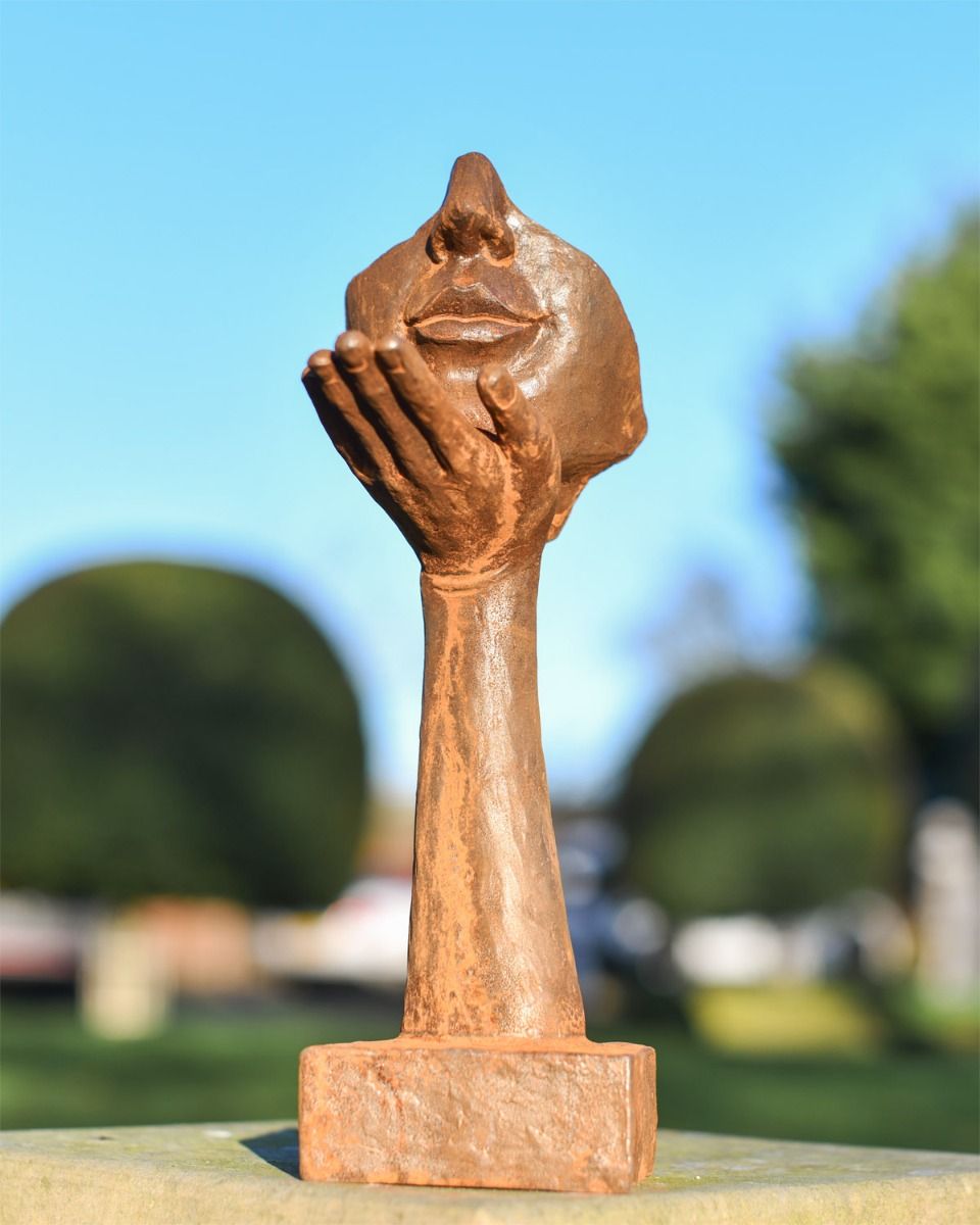 Rustic Cast Iron Blowing a Kiss Garden Sculpture