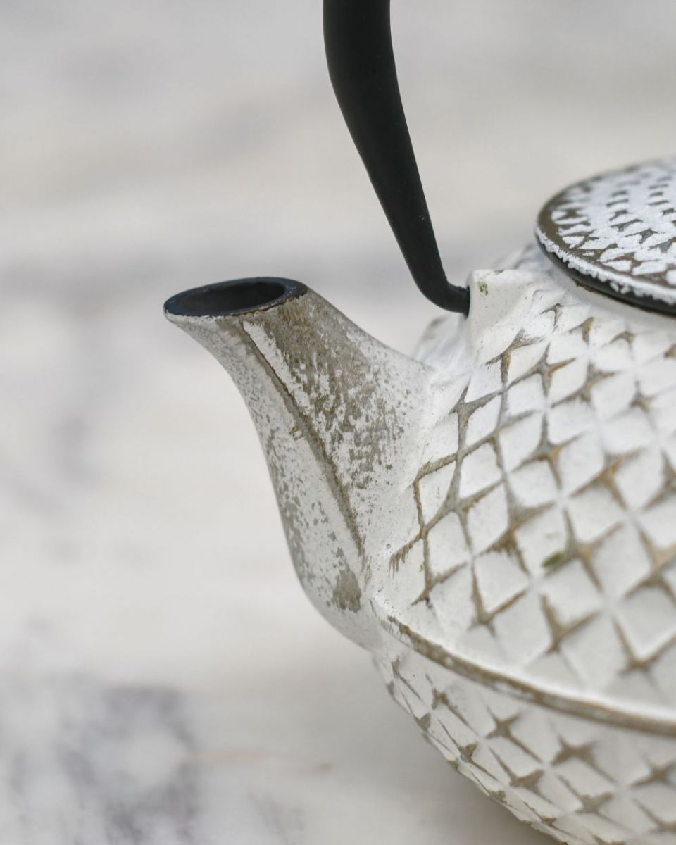 Close up of "Agawa" White Finish Cast Iron Japanese Style Teapot spout Close up of "Agawa" White Finish Cast Iron Japanese Style Teapot spout