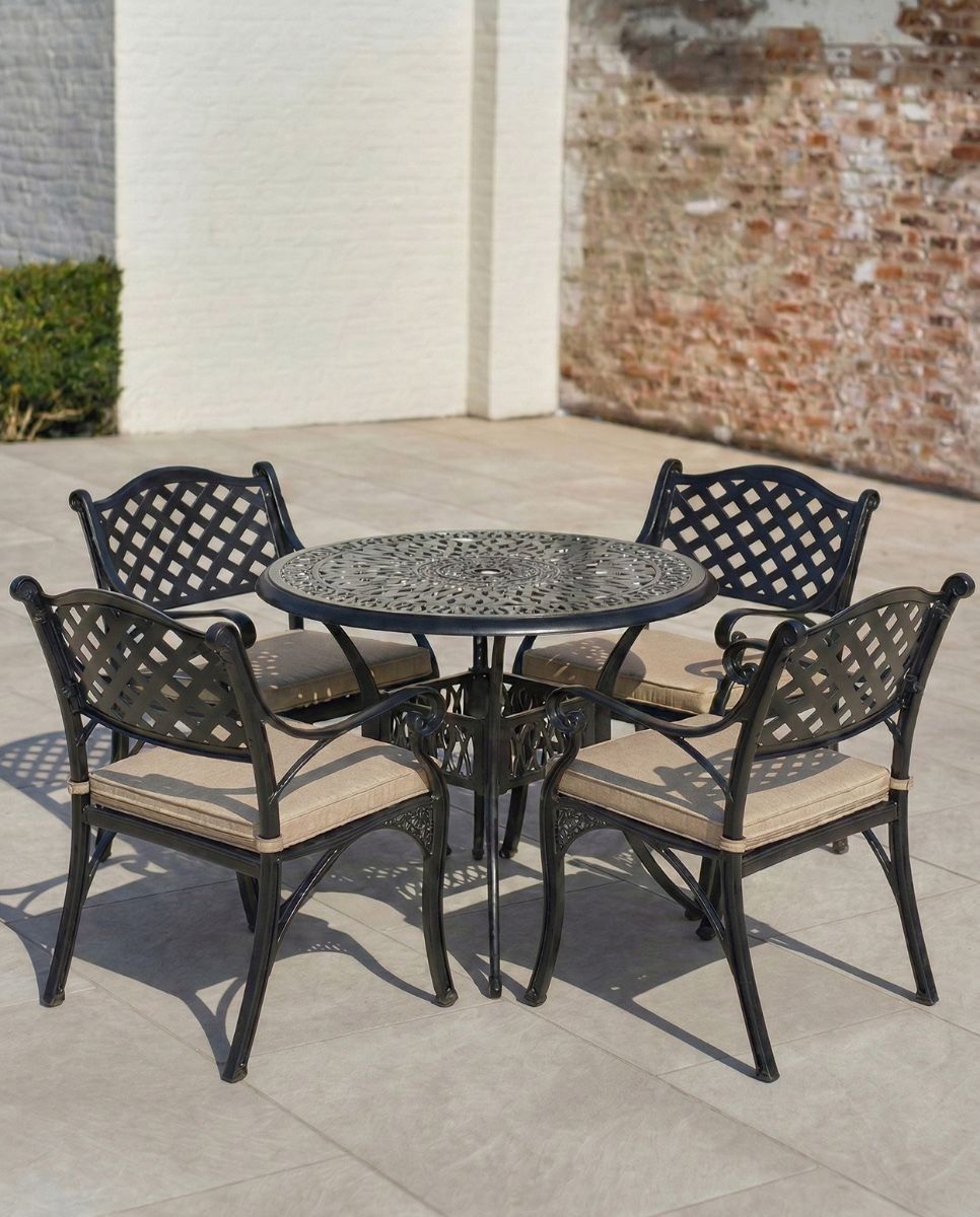 Aged Black "Farleigh" Four Seater Furniture Set in Situ on an Outdoor Garden Patio with cushions