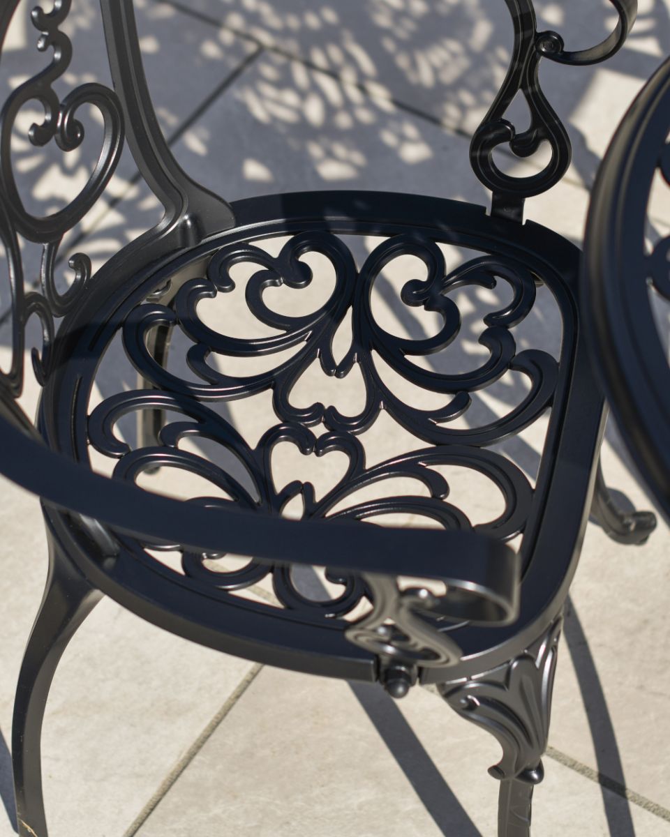 Aged Black "Harlington" Two Seater Garden Table & Chair Set Close Up Ornate Design