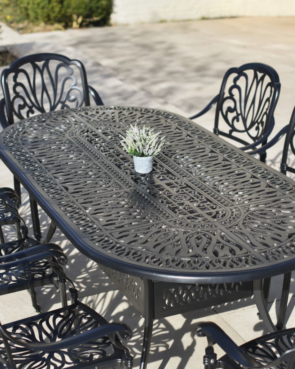 Aged Black Eight Seater Furniture Set Eith Ornate Details 