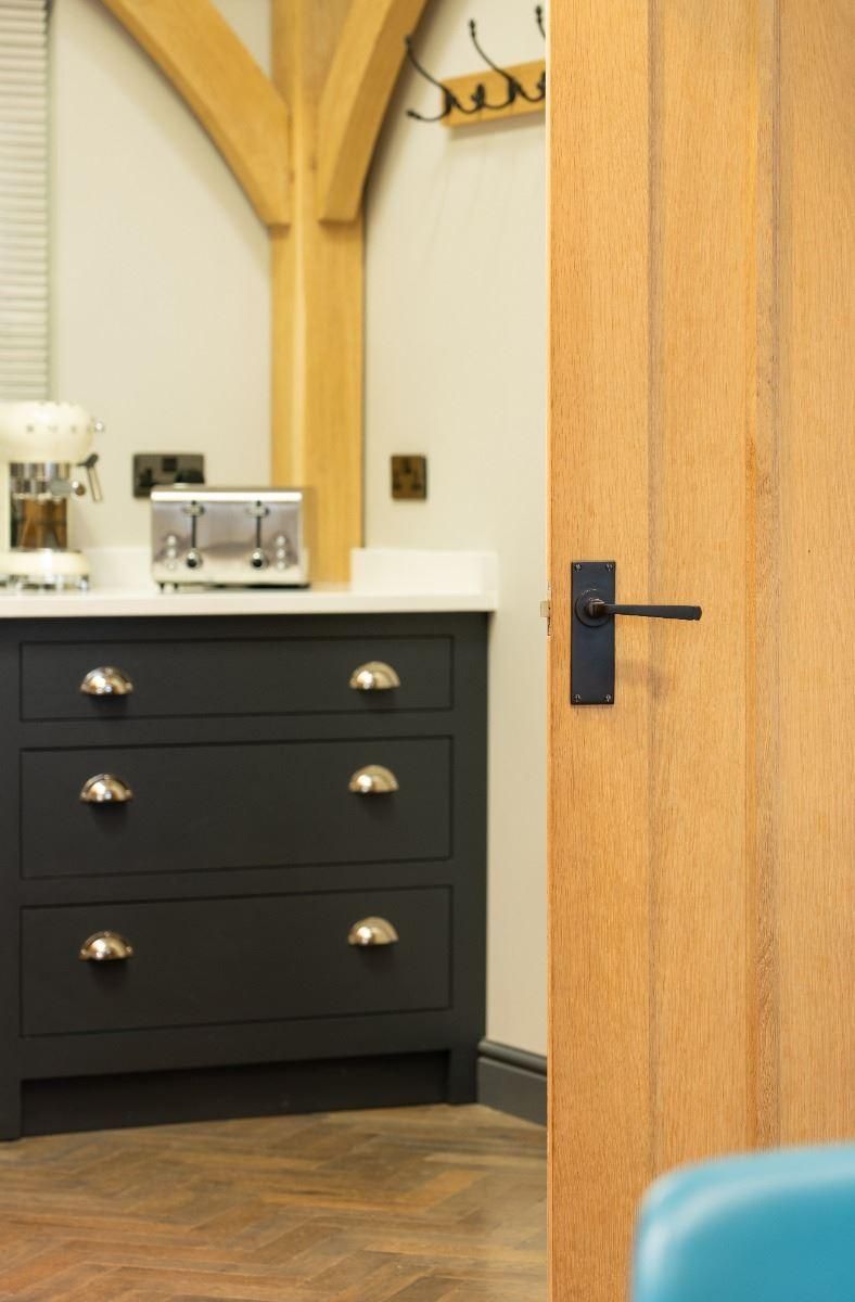 Aged Bronze Lever Latch Door Handle in Situ