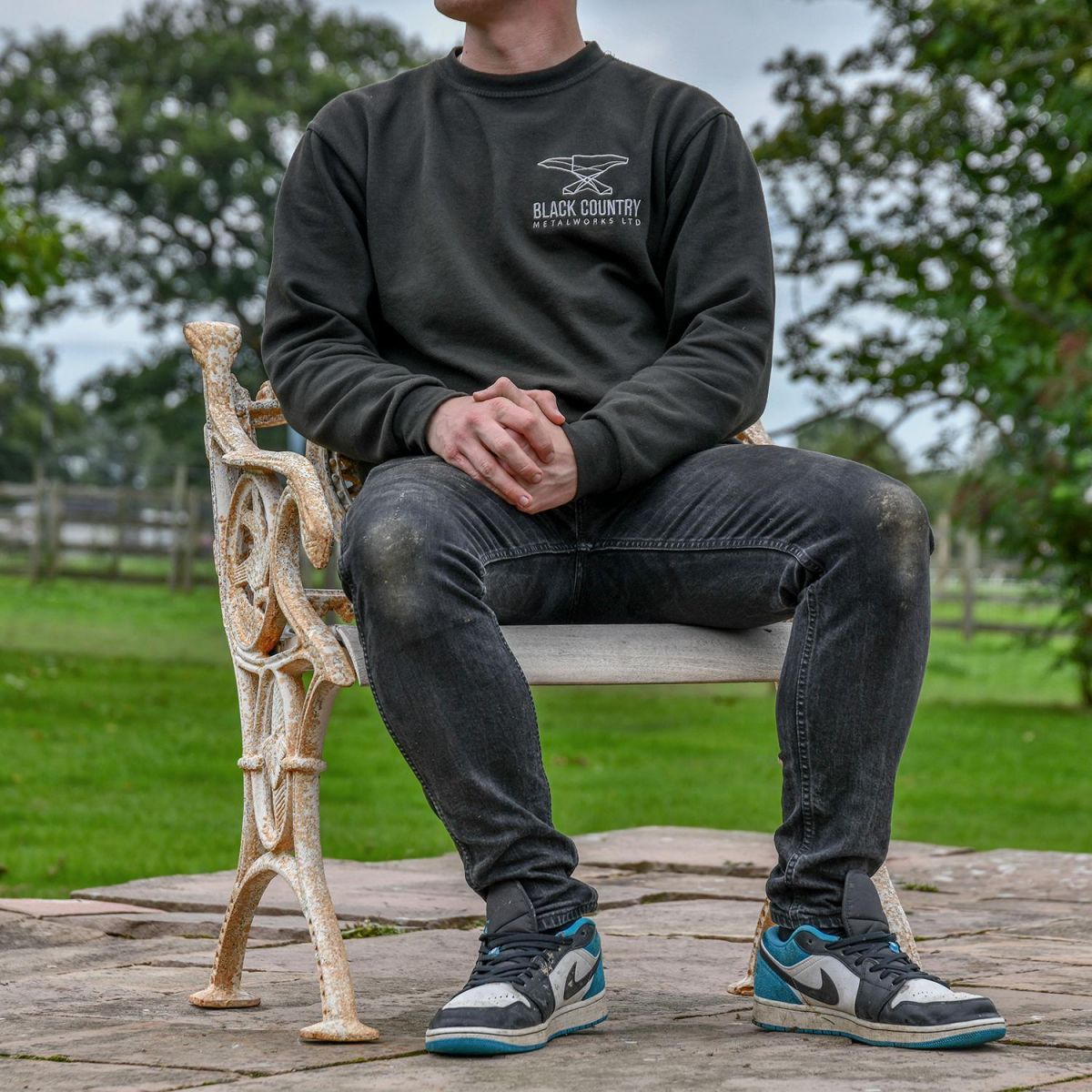 Aged Cream Cast Iron Dog One Seat Park Bench to Scale