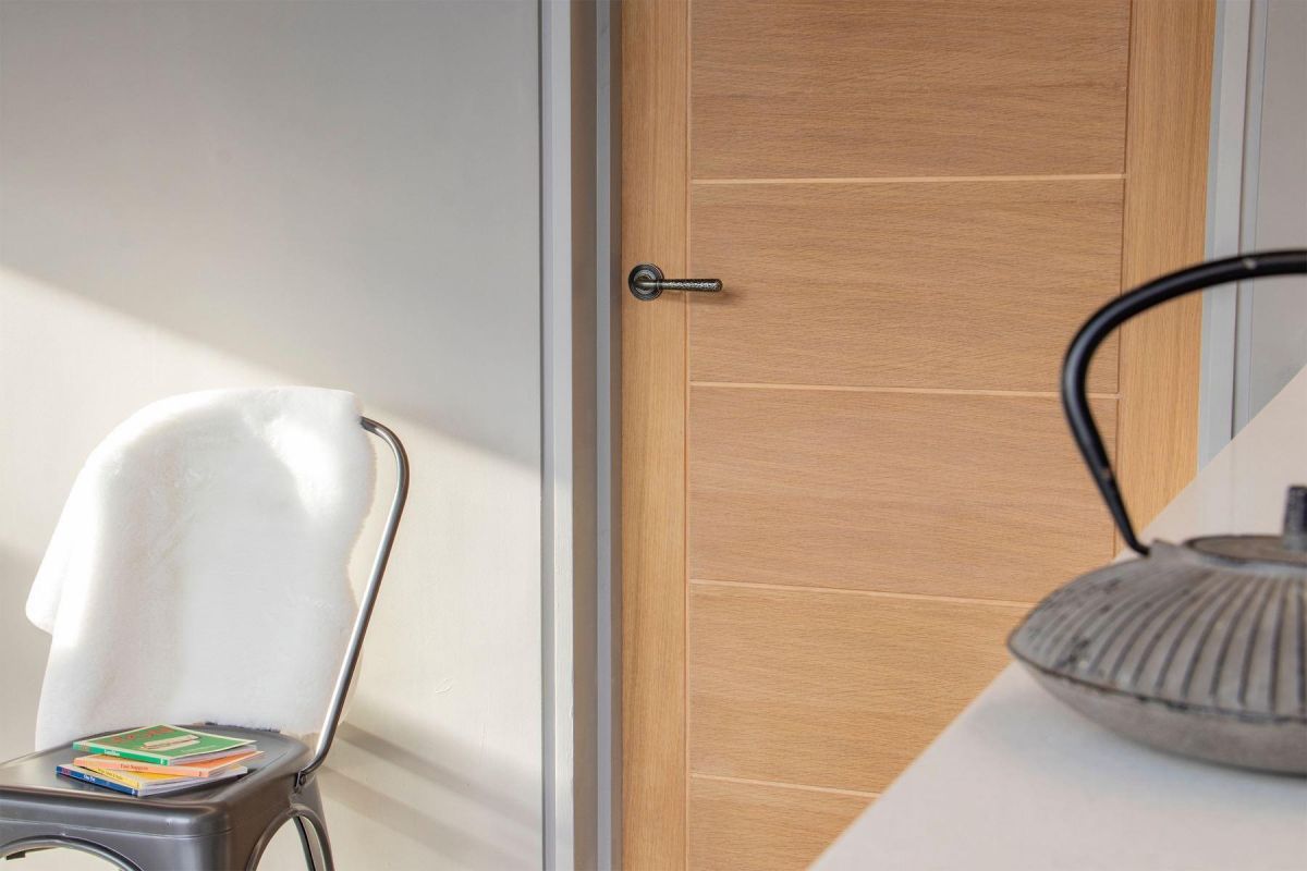 Aged Pewter Hammered Unsprung Lever Door Handle on Beehive Rose on Door Aged Pewter Hammered Unsprung Lever Door Handle on Beehive Rose on Door