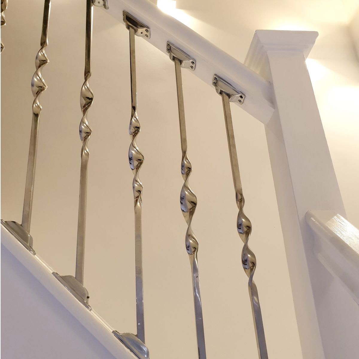 Alessi Single Bold Twist Stainless Steel Stair Spindle Fitted In Modern House