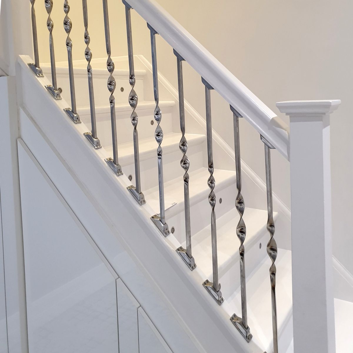 Alessi Single Bold Twist Stainless Steel Stair Spindle Installed On Staircase