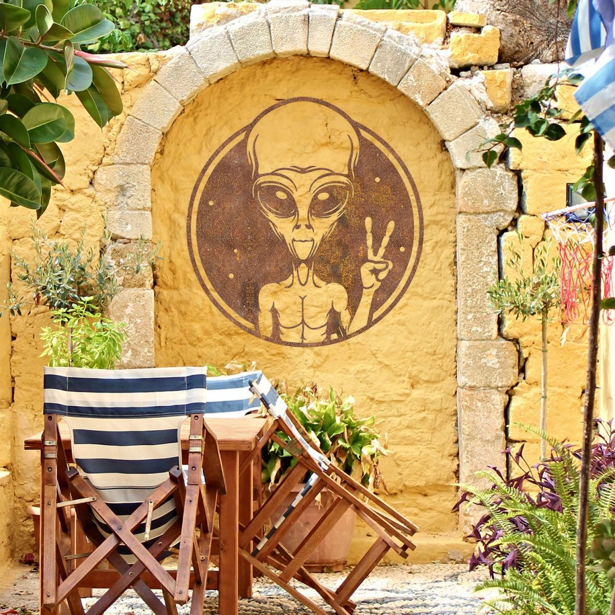 Peace Sign Alien Wall Art in Situ on a Yellow Wall Peace Sign Alien Wall Art in Situ on a Yellow Wall
