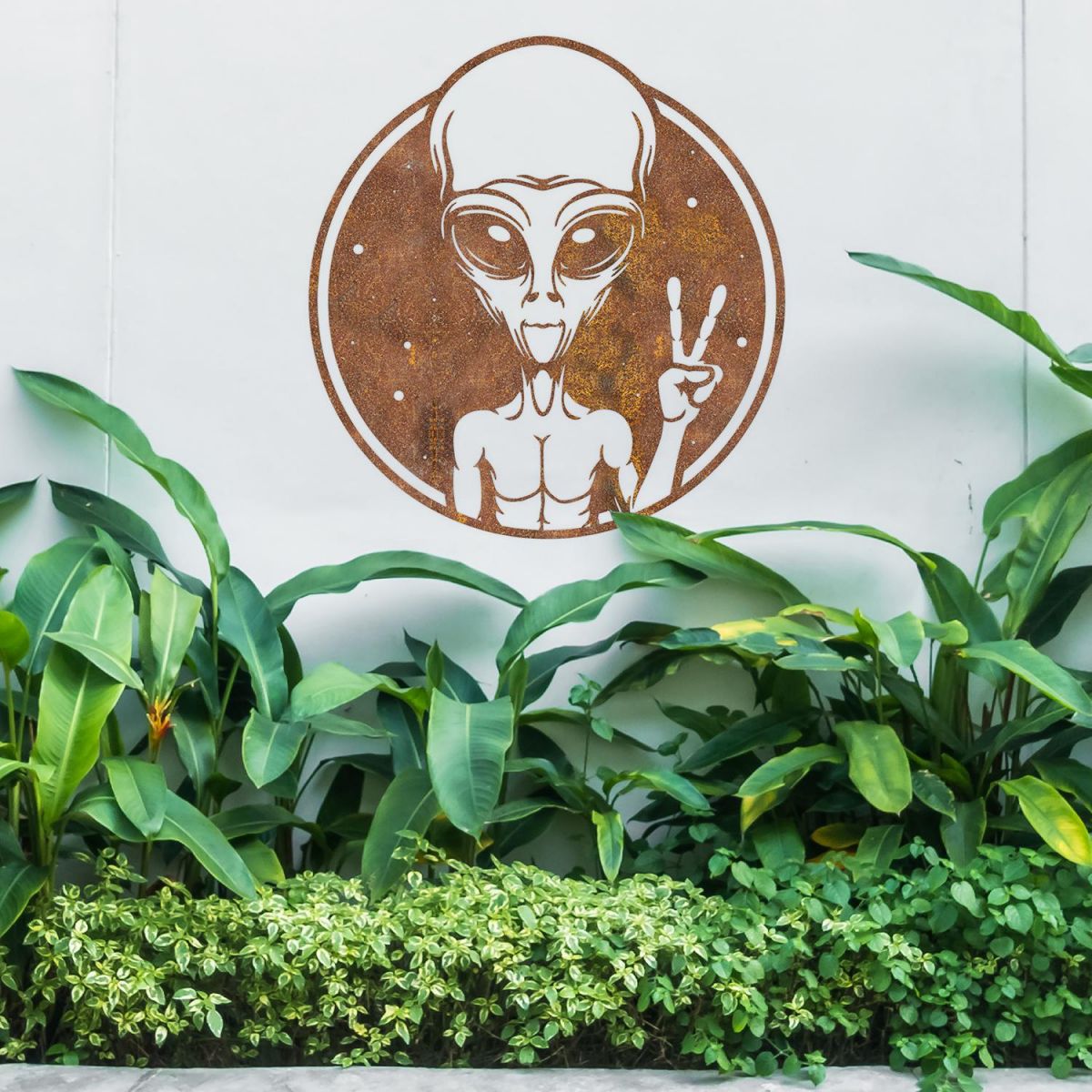 Peace Sign Alien Wall Art in Use in the Garden Peace Sign Alien Wall Art in Use in the Garden