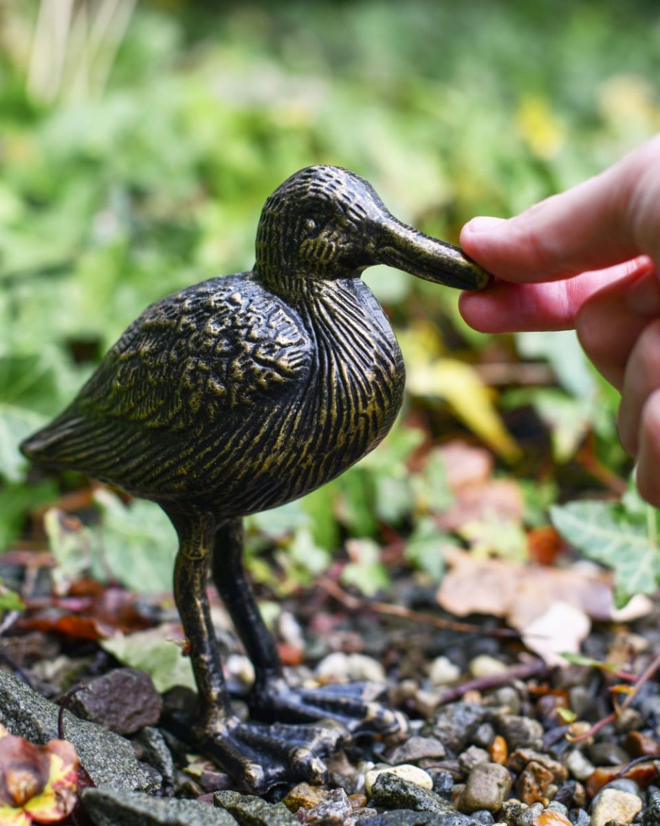 Avocet sculpture with hand for scale Avocet sculpture with hand for scale