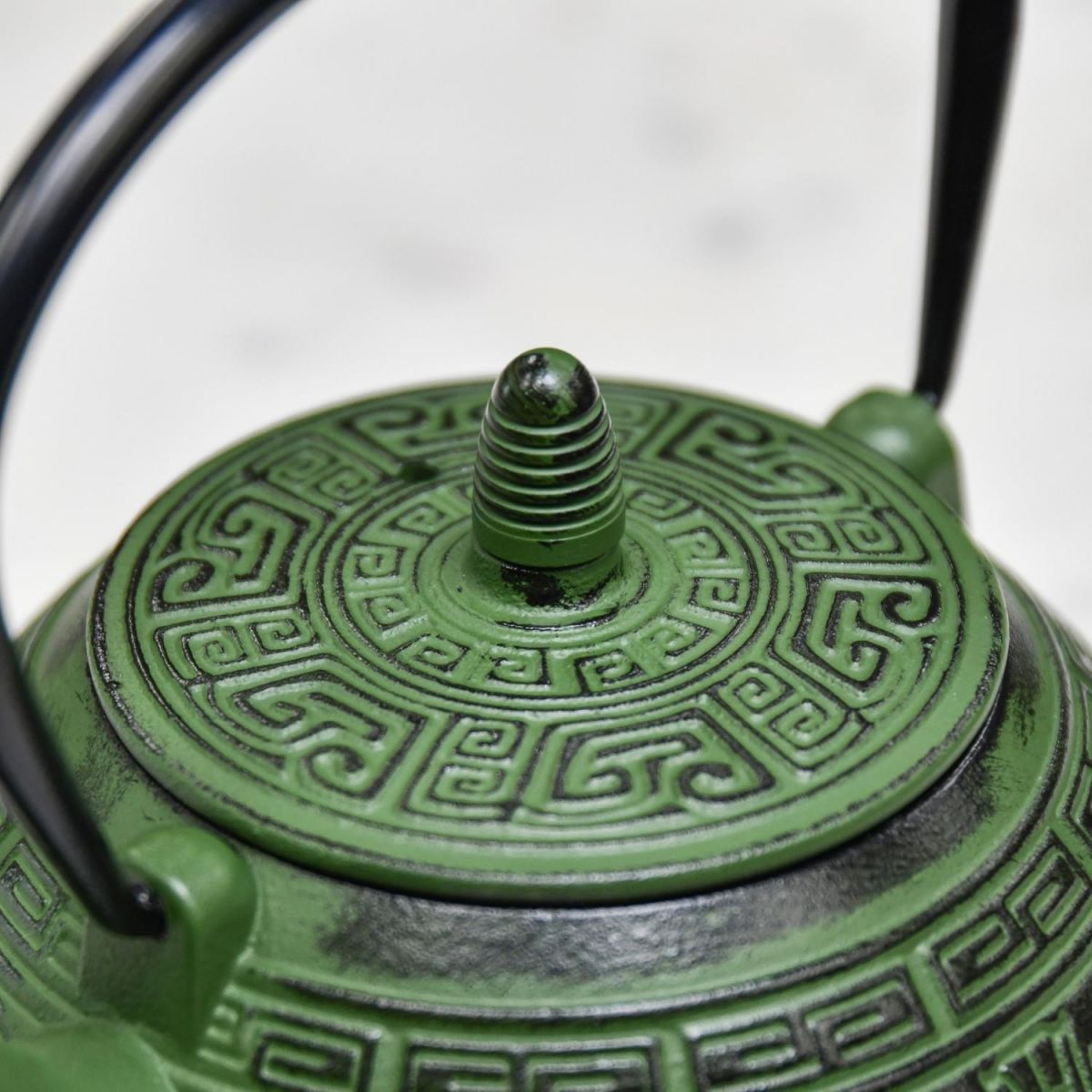 Close-Up of Closed Lid on Ancient Oriental "Ahuic" Green Cast Iron Teapot 
