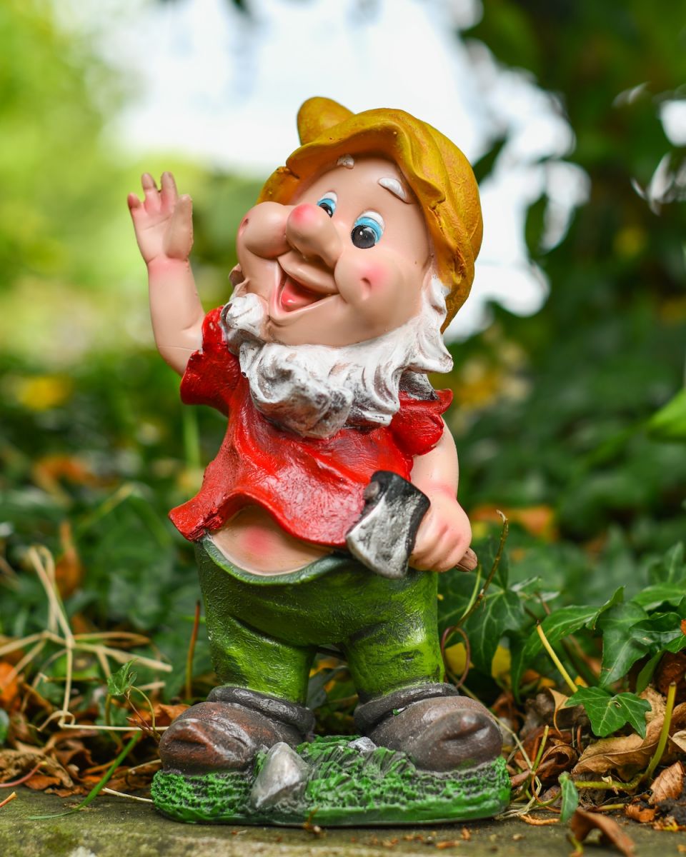 Angled view of friendly garden gnome statue