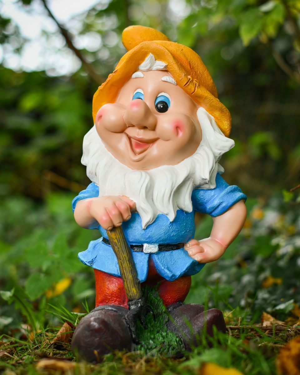 Angled view of colourful outdoor gnome sculpture