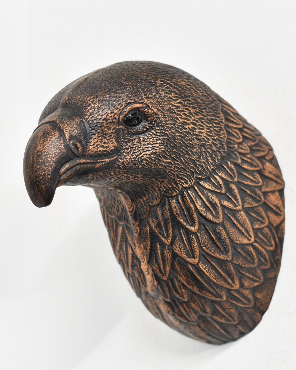 Angled view of copper eagle wall bust