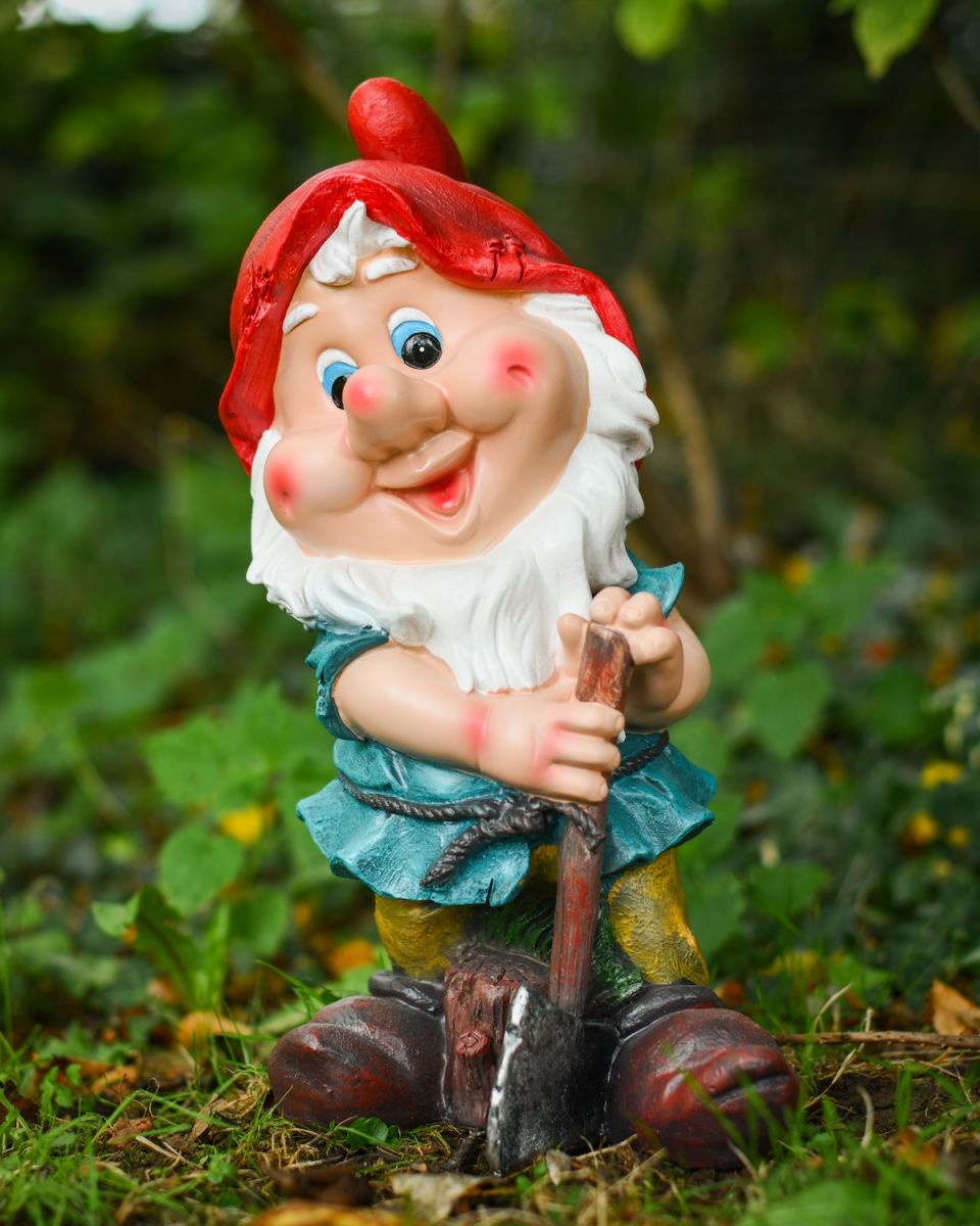 Angled view of colourful garden gnome ornament