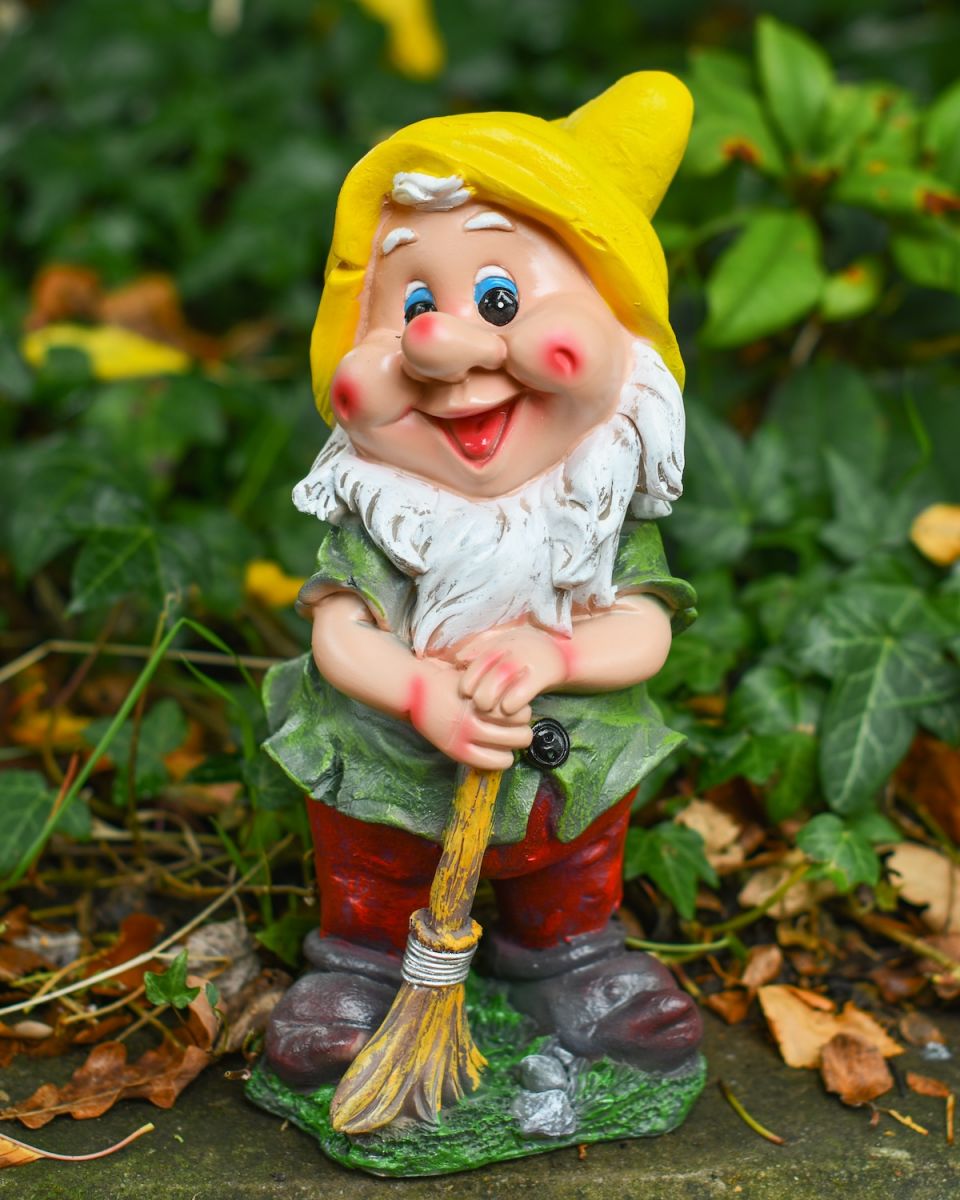 Angled view of colourful garden gnome sculpture