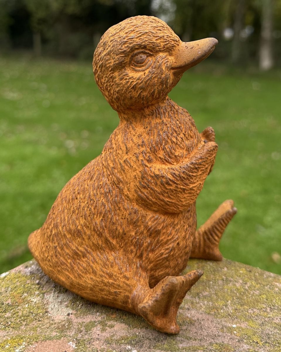 Side view of Rustic Cast Iron "Daisy" the Duckling Sculpture