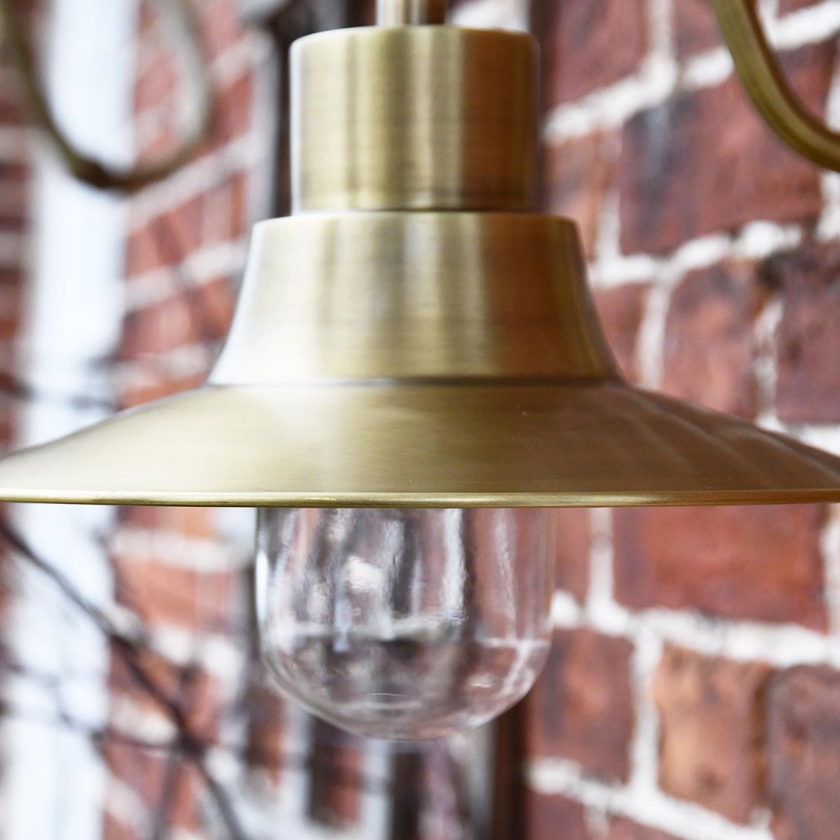 Close-up of the Antique Brass Finish on the Wall Light Close-up of the Antique Brass Finish on the Wall Light