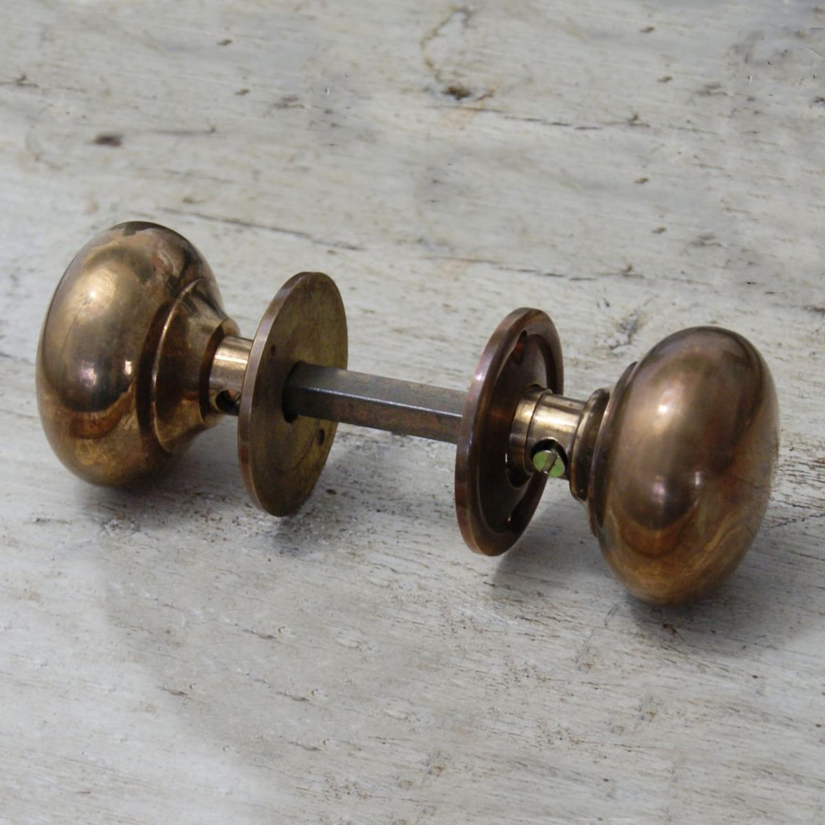Traditional Door Knobs in Antique Brass