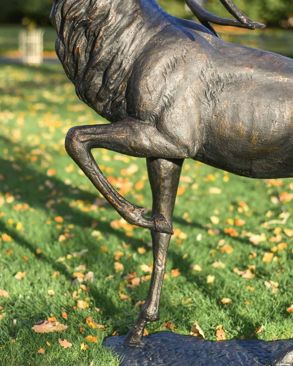 Close-Up of Bodywork on Antique Bronze "Regiment" Roaring Stag Garden Sculpture on Stand Close-Up of Bodywork on Antique Bronze "Regiment" Roaring Stag Garden Sculpture on Stand