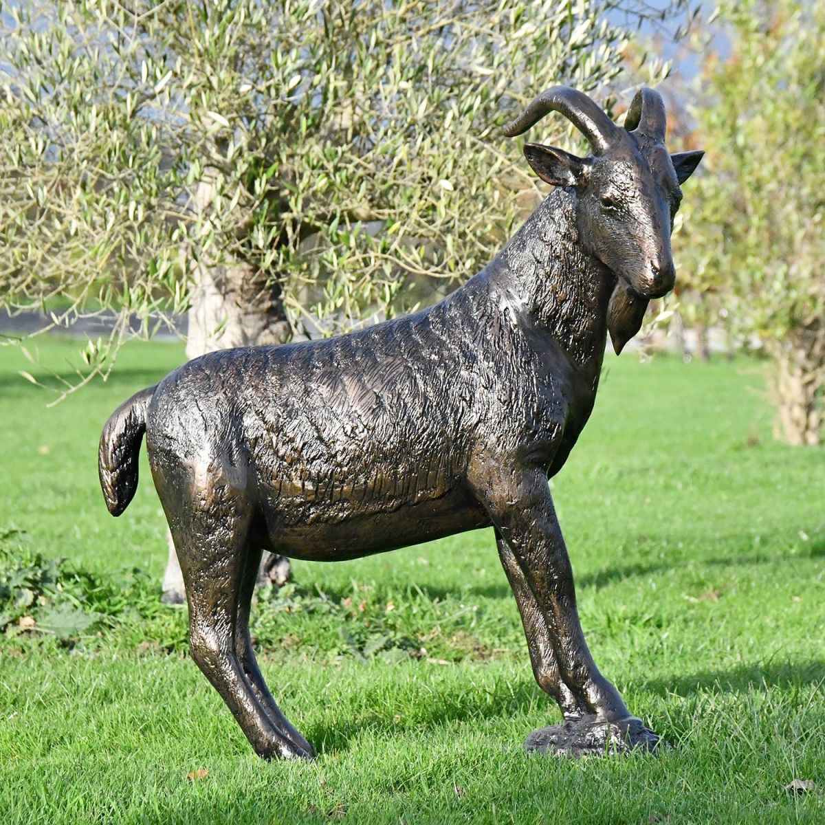 Antique Bronze Billy Goat Garden Sculpture in the Garden