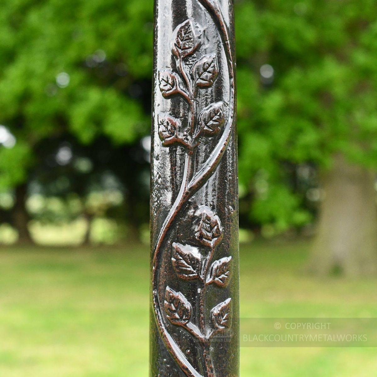 Antique Brown Floral Scrollwork On Lamp Post Column