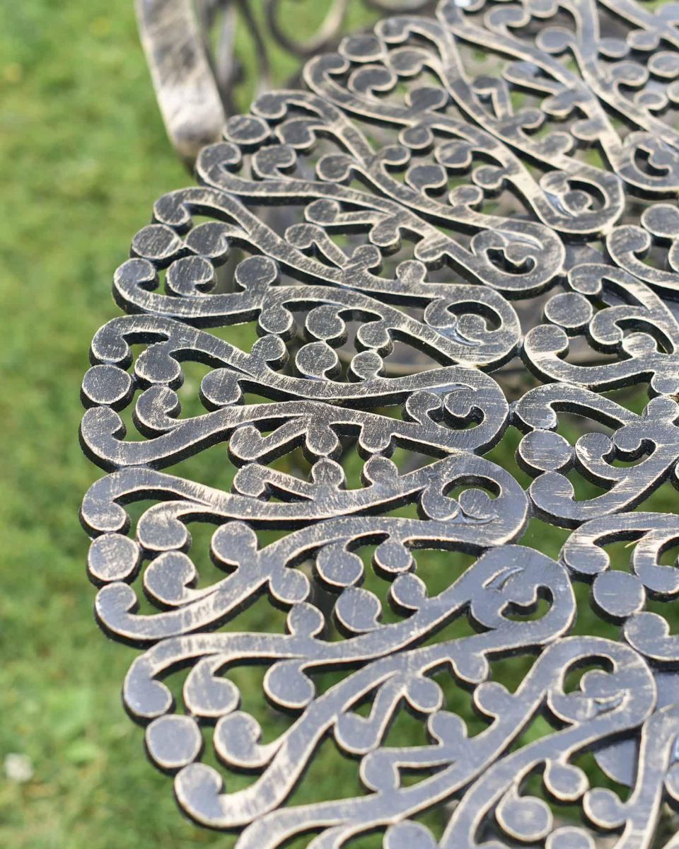 Close-Up of Table Pattern on Antique Gold "Royal Ascott" Two Seater Bistro Set Close-Up of Table Pattern on Antique Gold "Royal Ascott" Two Seater Bistro Set