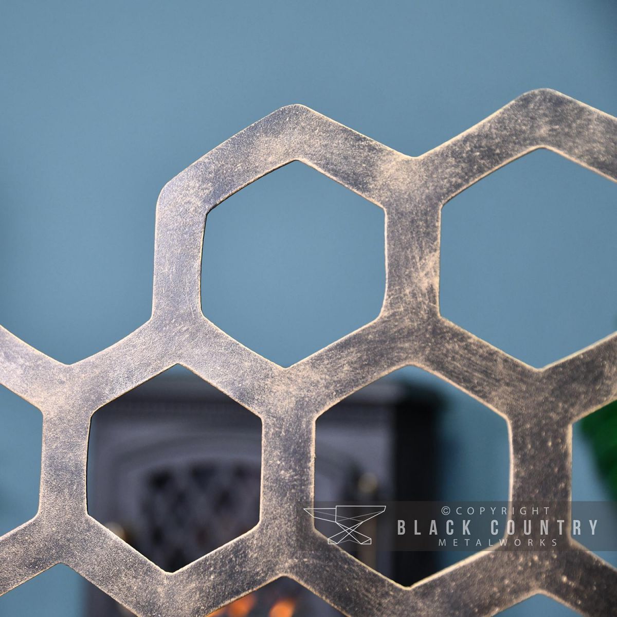 Close-up of the Antique Gold Honey Come Design