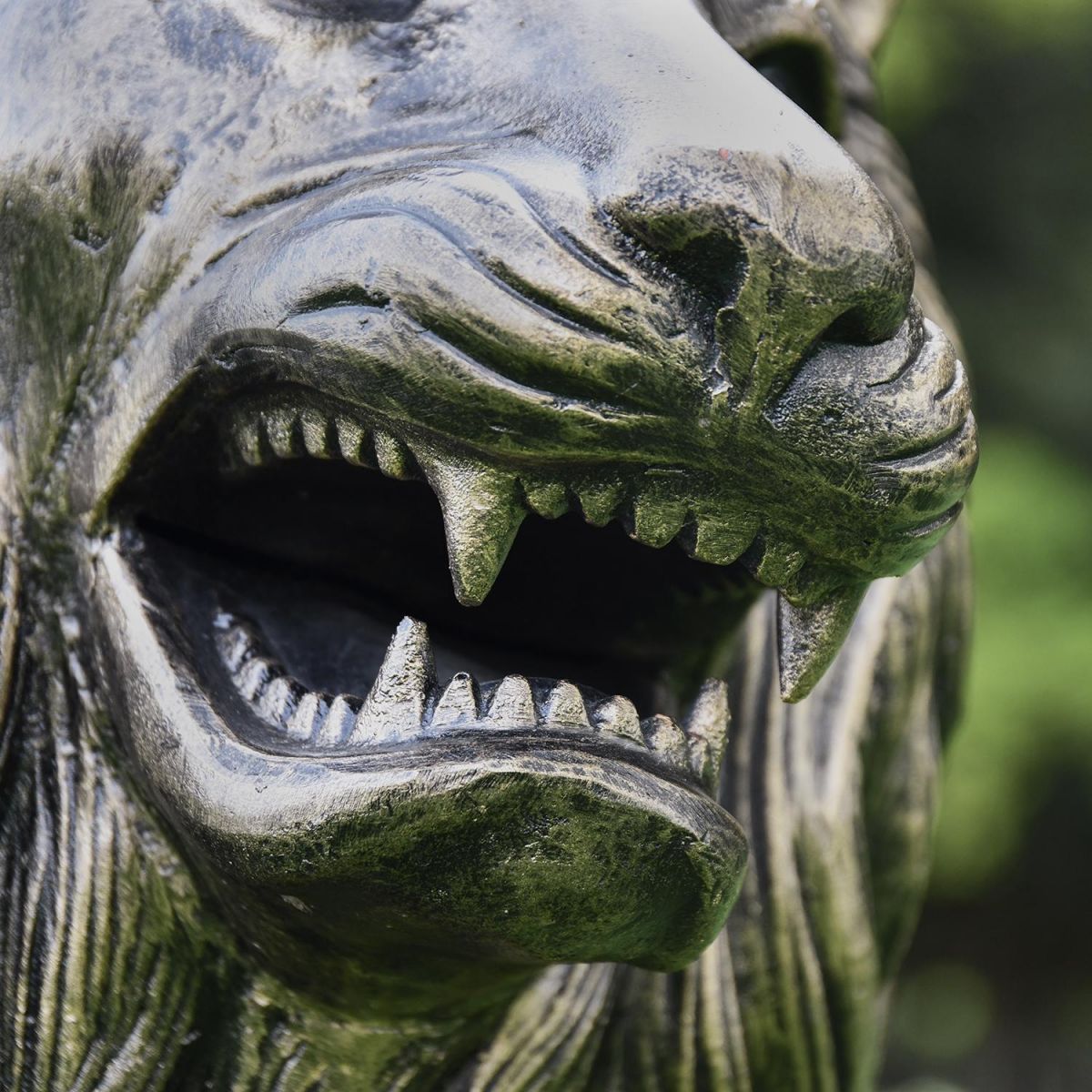 Close-up of the Face of the Antique Gold Lion Sculpture