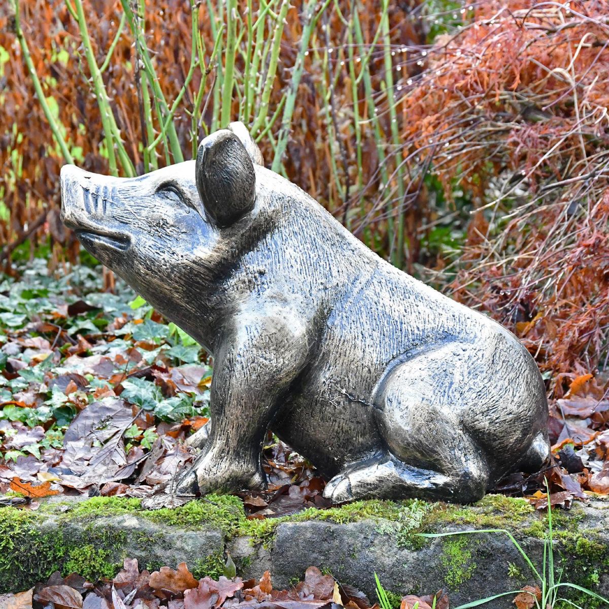 View of the Side of the Antique Gold Sitting Pig Sculpture View of the Side of the Antique Gold Sitting Pig Sculpture