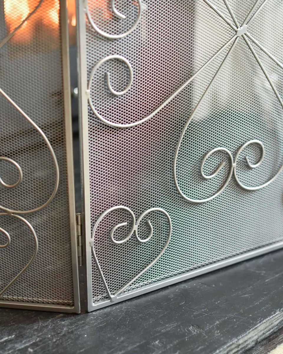 Close-Up of Heart Design Pattern on Three Fold Fire Guard