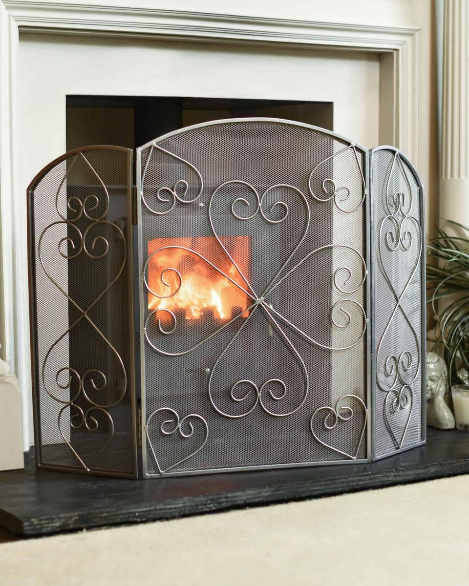 Antique Pewter Heart Design Three Fold Fireguard in Situ