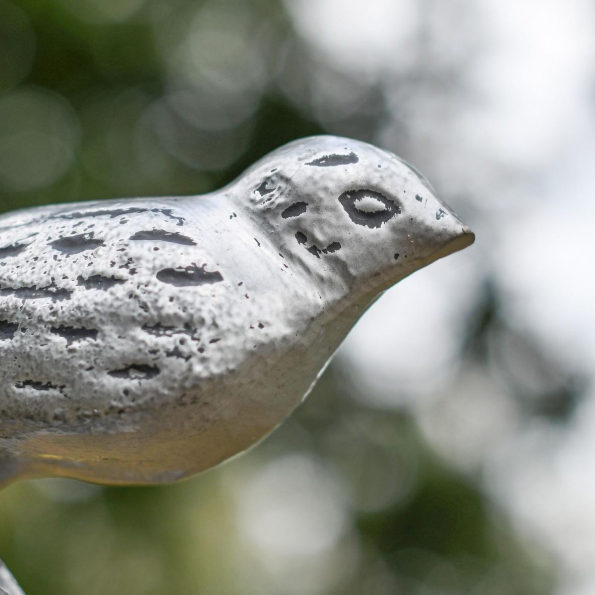 Close-up of Antique Silver Finish on Bird Sculpture