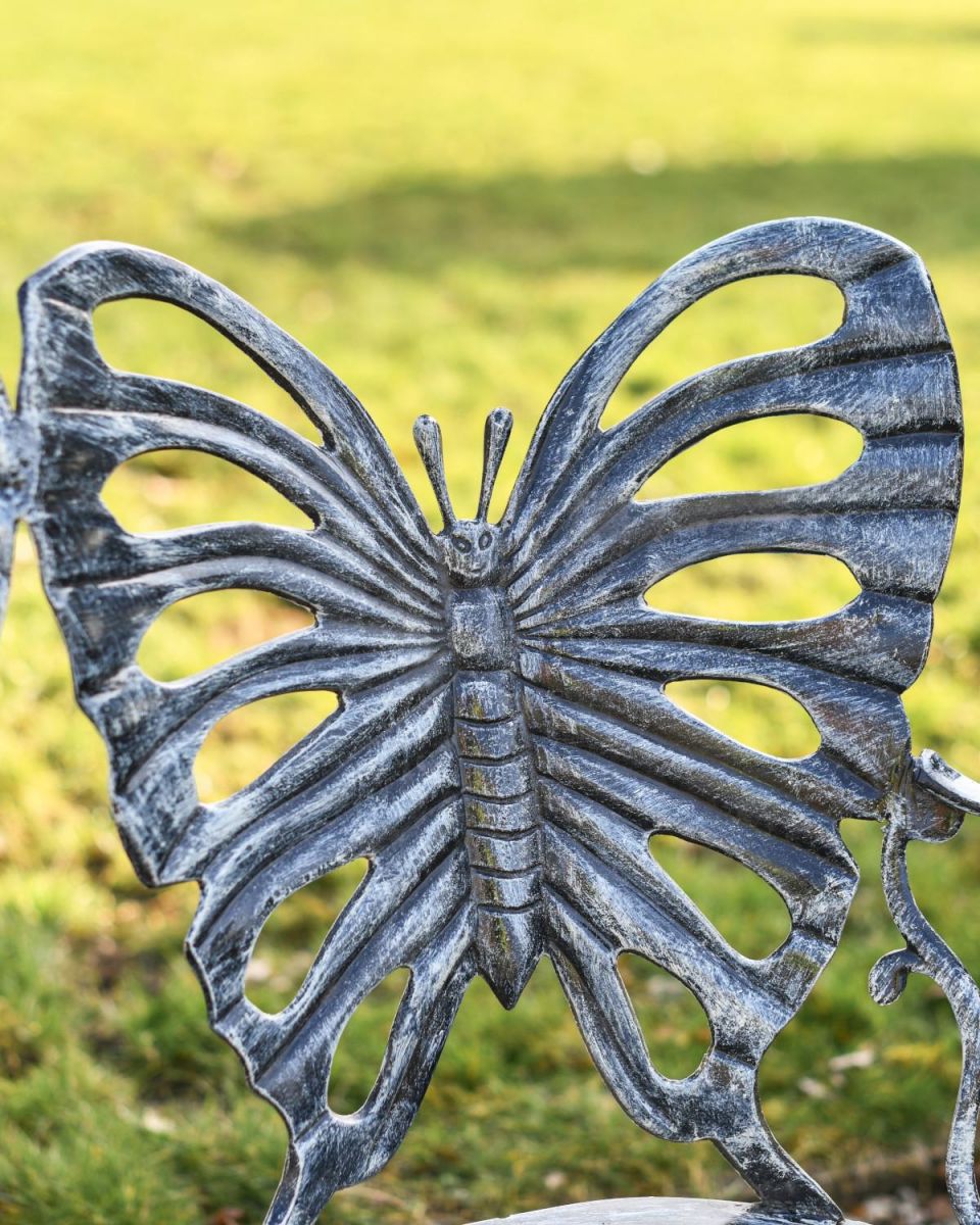 Close Up of Antique Silver Butterfly Design Two Seater Bench Bench Back Close Up of Antique Silver Butterfly Design Two Seater Bench Bench Back