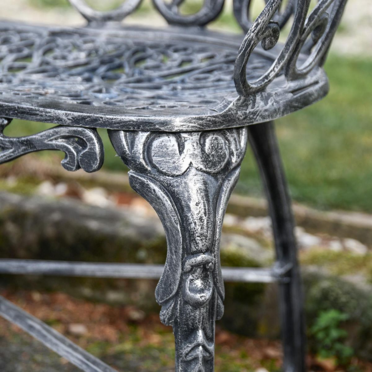 Close-Up of Antique Silver "Sunrise-to-Sunset" Two Seater Garden Bench in Situ