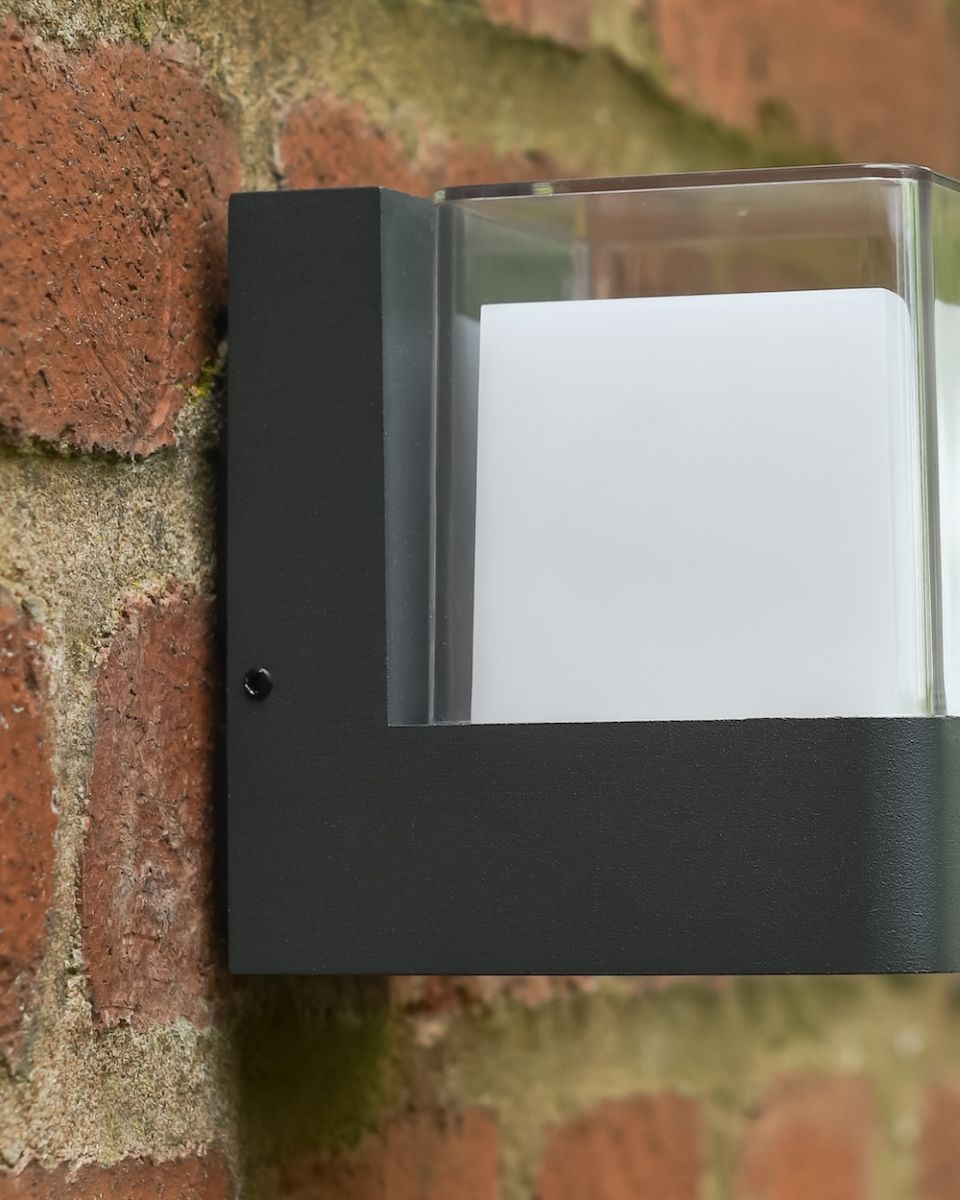 Close up of intricate detail on modern garden wall light Close up of intricate detail on modern garden wall light